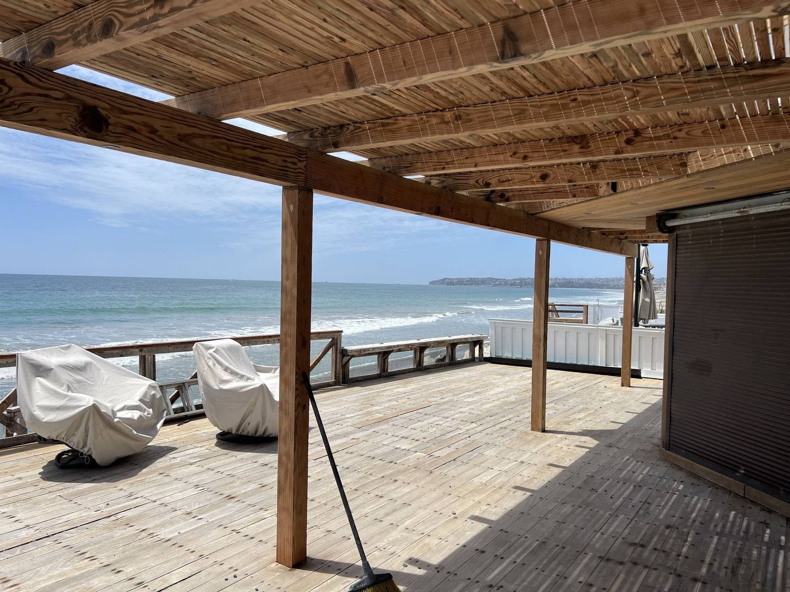 Walnut-blasted deck and exposed beams after coating removal by AAFB Blasting