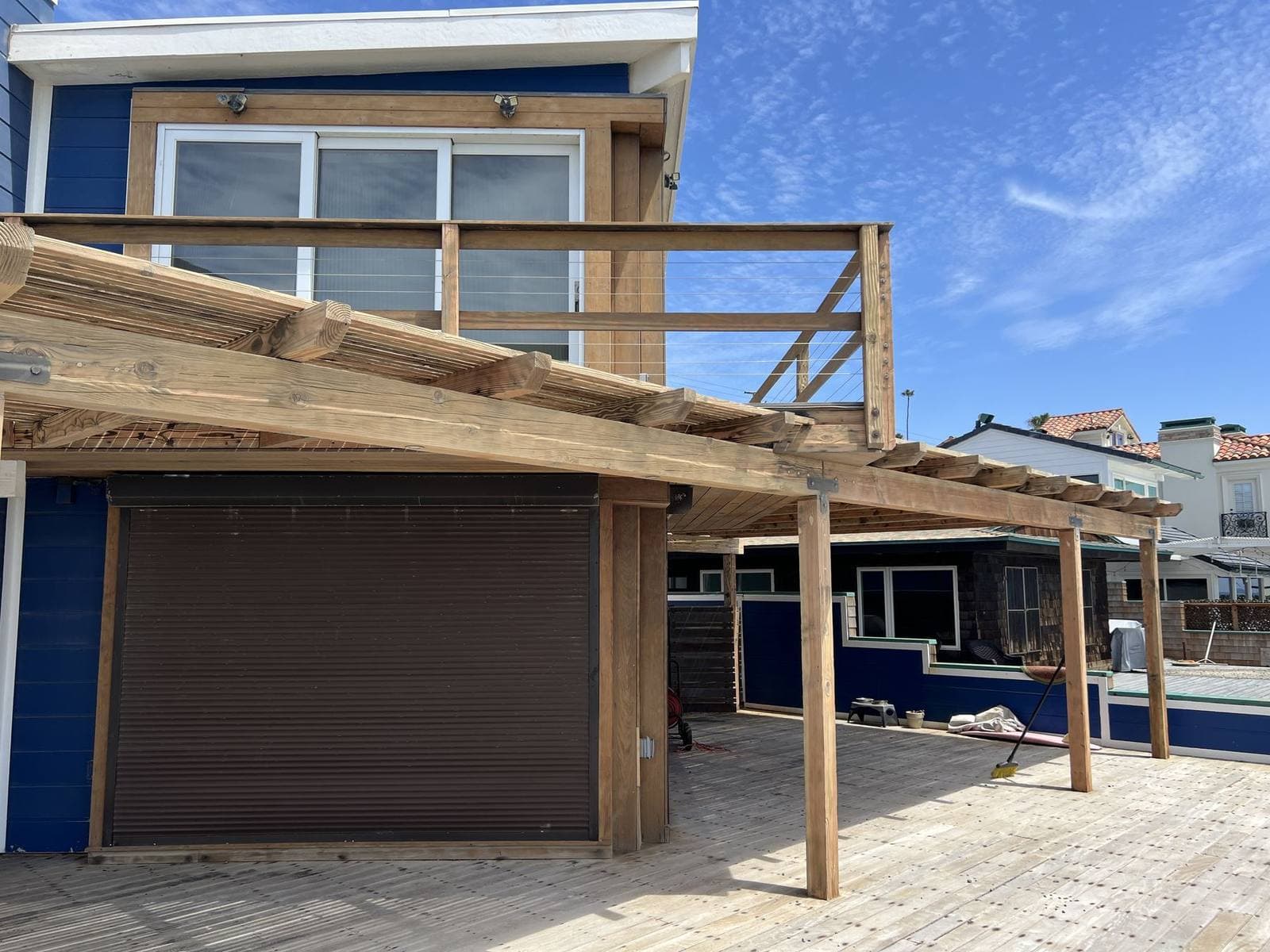 Wood deck after walnut-shell blasting restored the grain