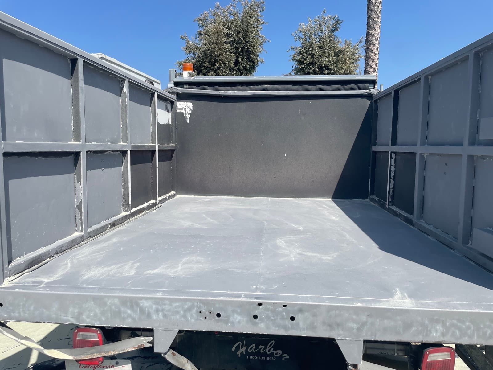 Dump truck bed after dustless blasting
