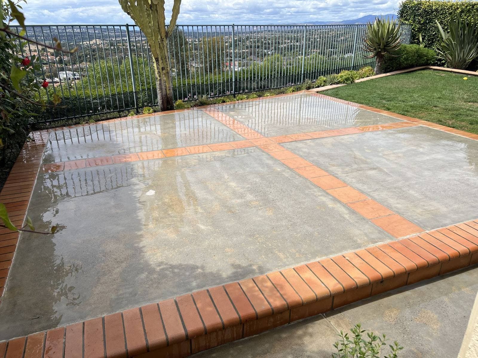 Painted patio surface after mobile dustless blasting removed old coating