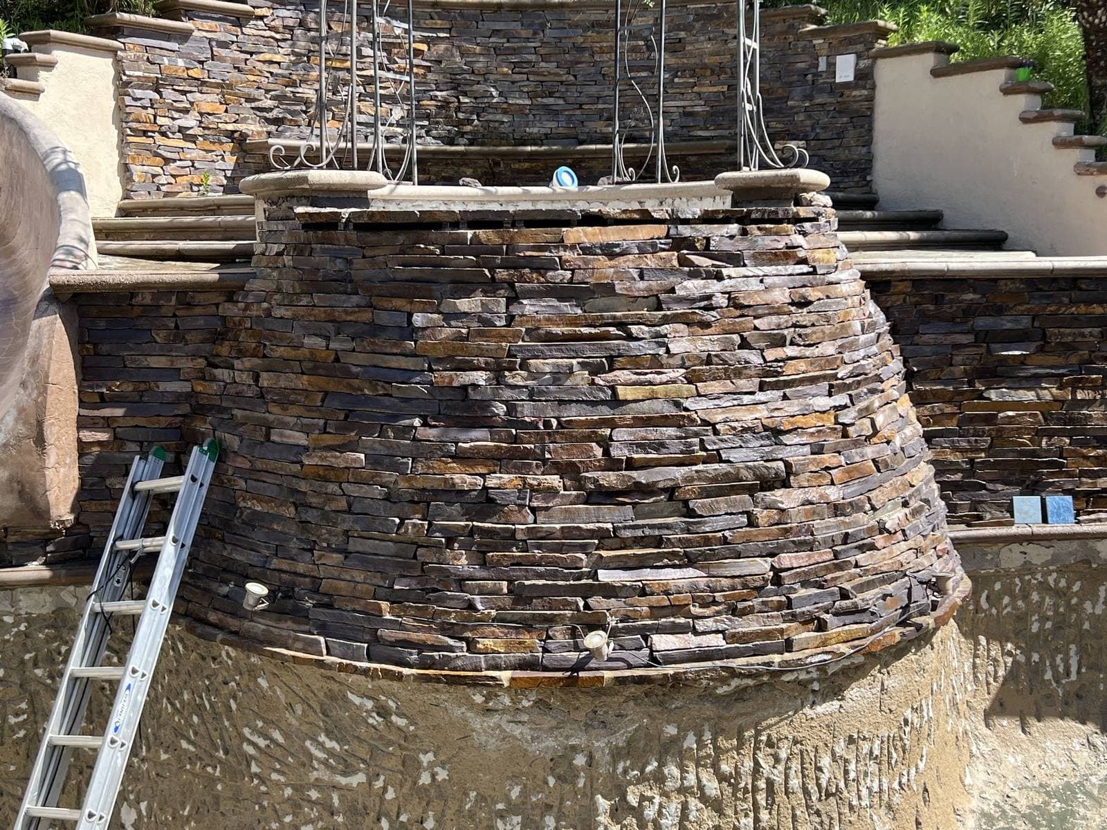 Pool waterfall feature after calcium removal and dustless blasting