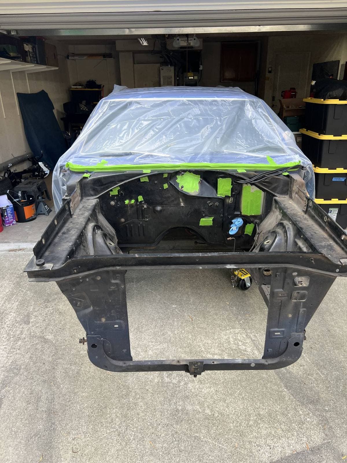 Vehicle engine bay before dustless sandblasting