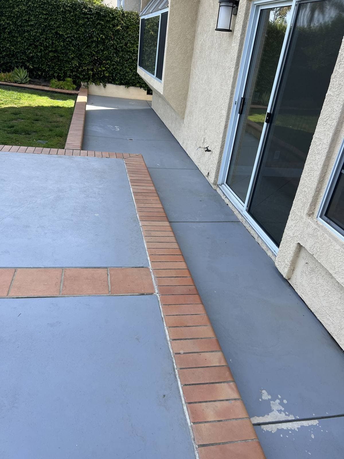 Residential front walkway before old coating removal