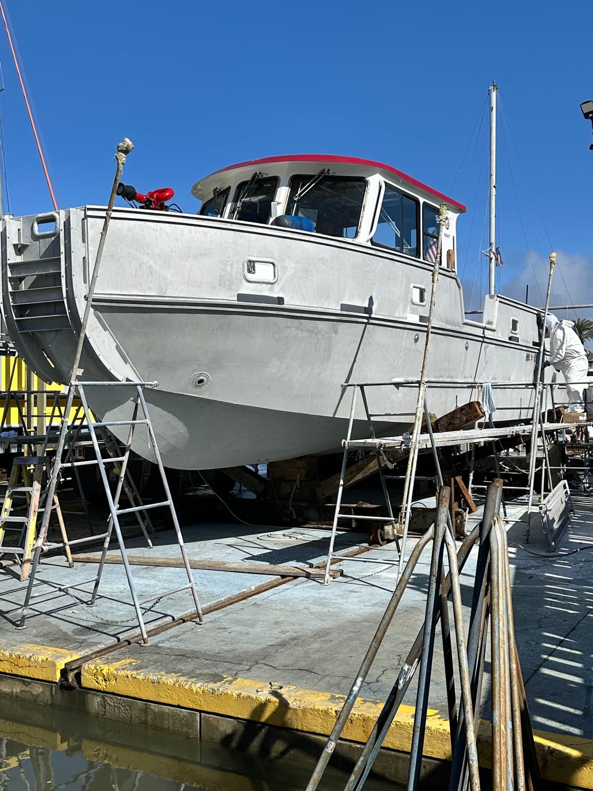 Large boat hull blasting in drydock