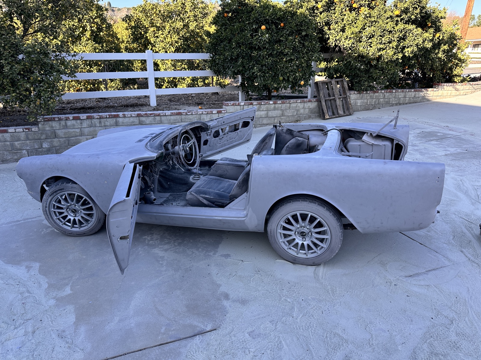 Classic convertible stripped to bare metal
