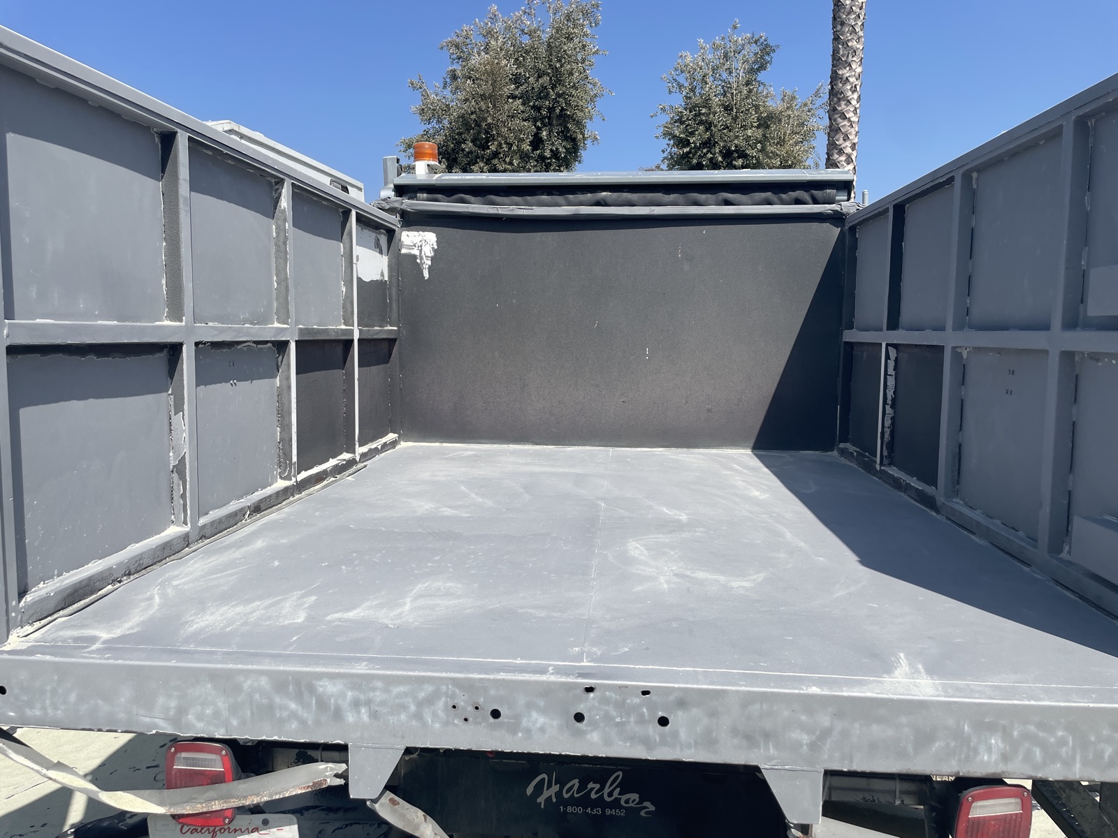 Dump truck bed after dustless blasting