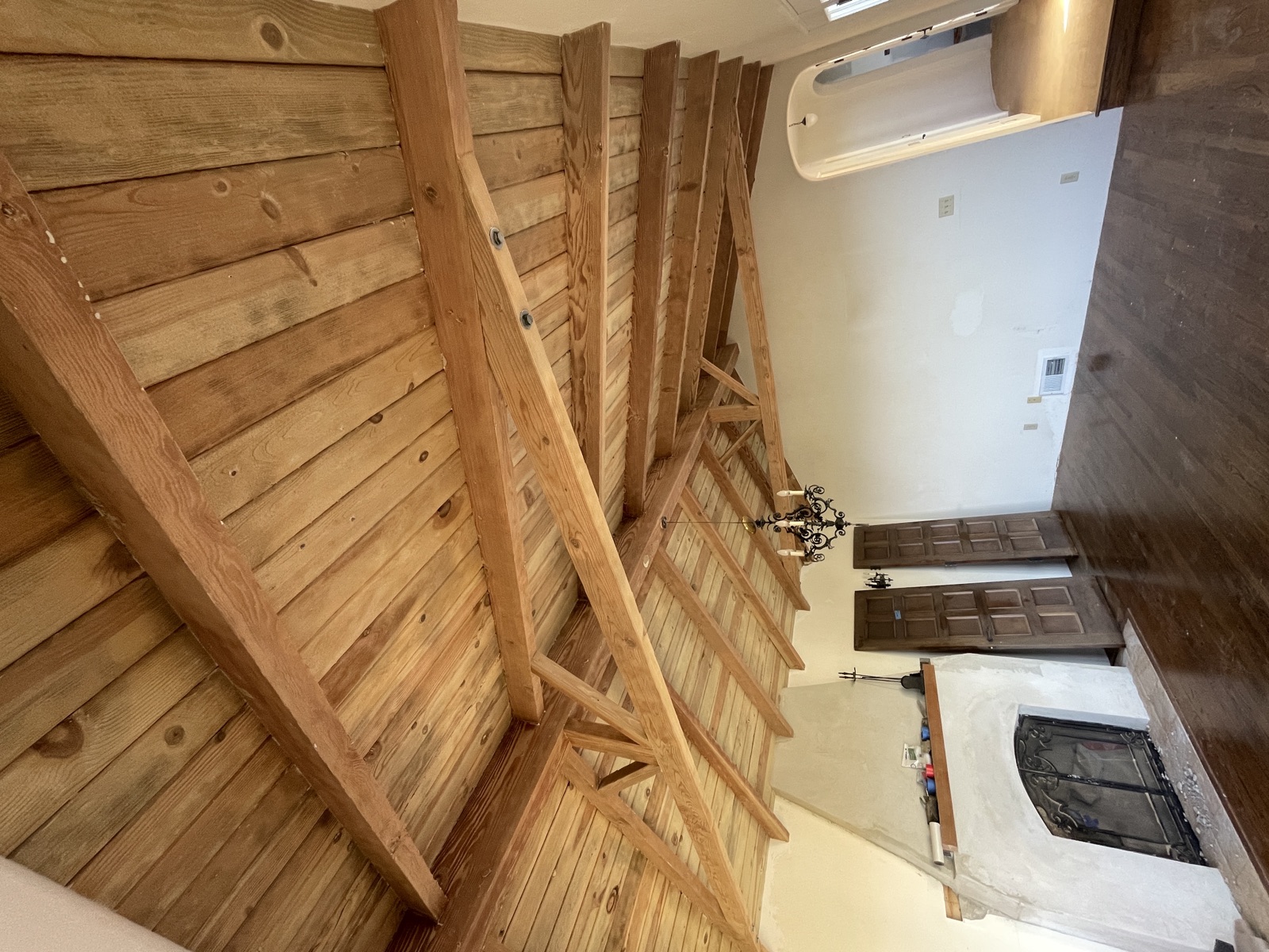 Interior exposed wood beams restored